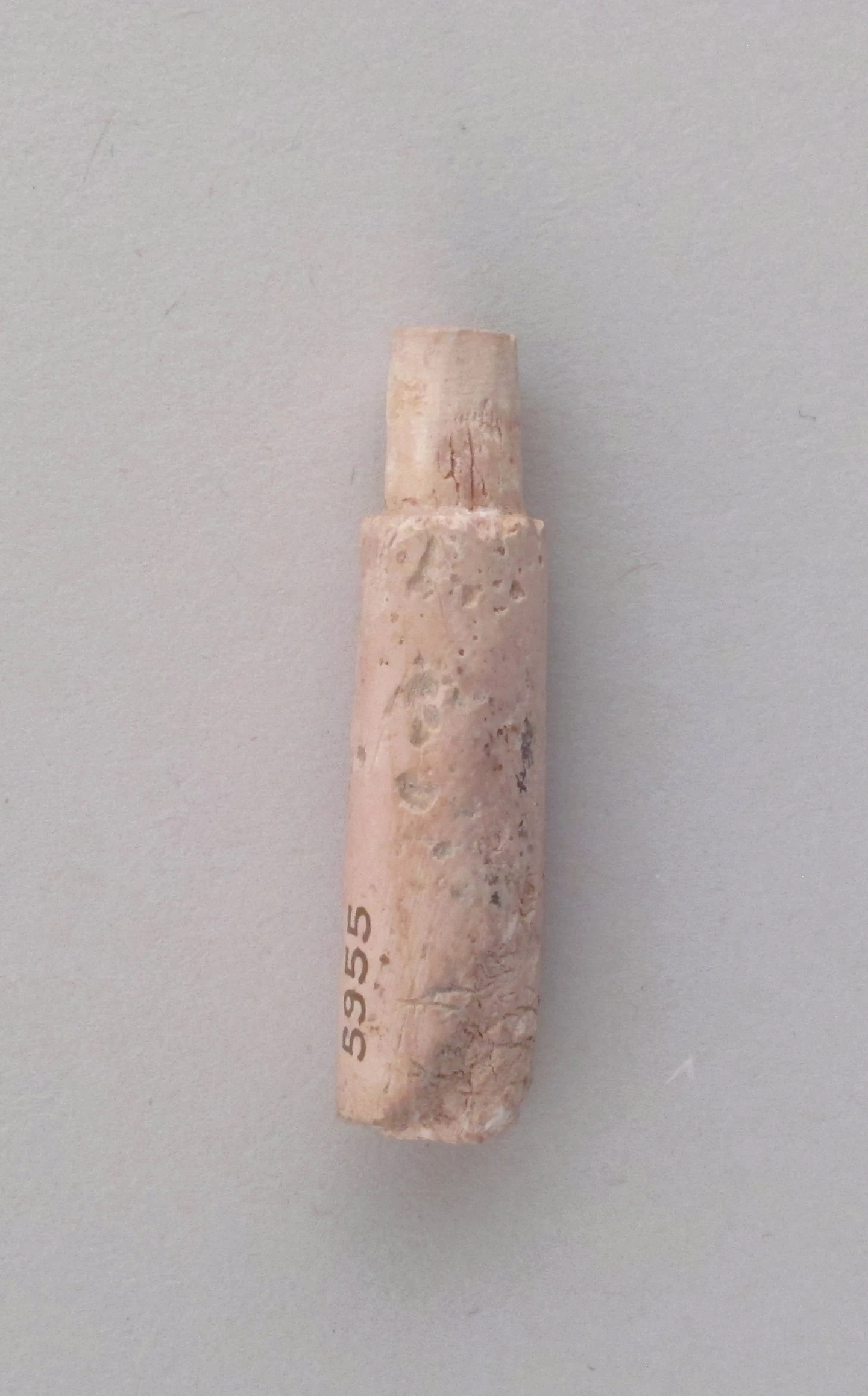 Peg, part of a spindle staff