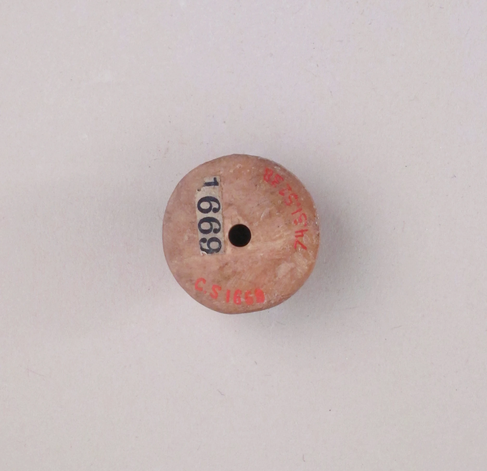 Ivory conical spindle whorl
