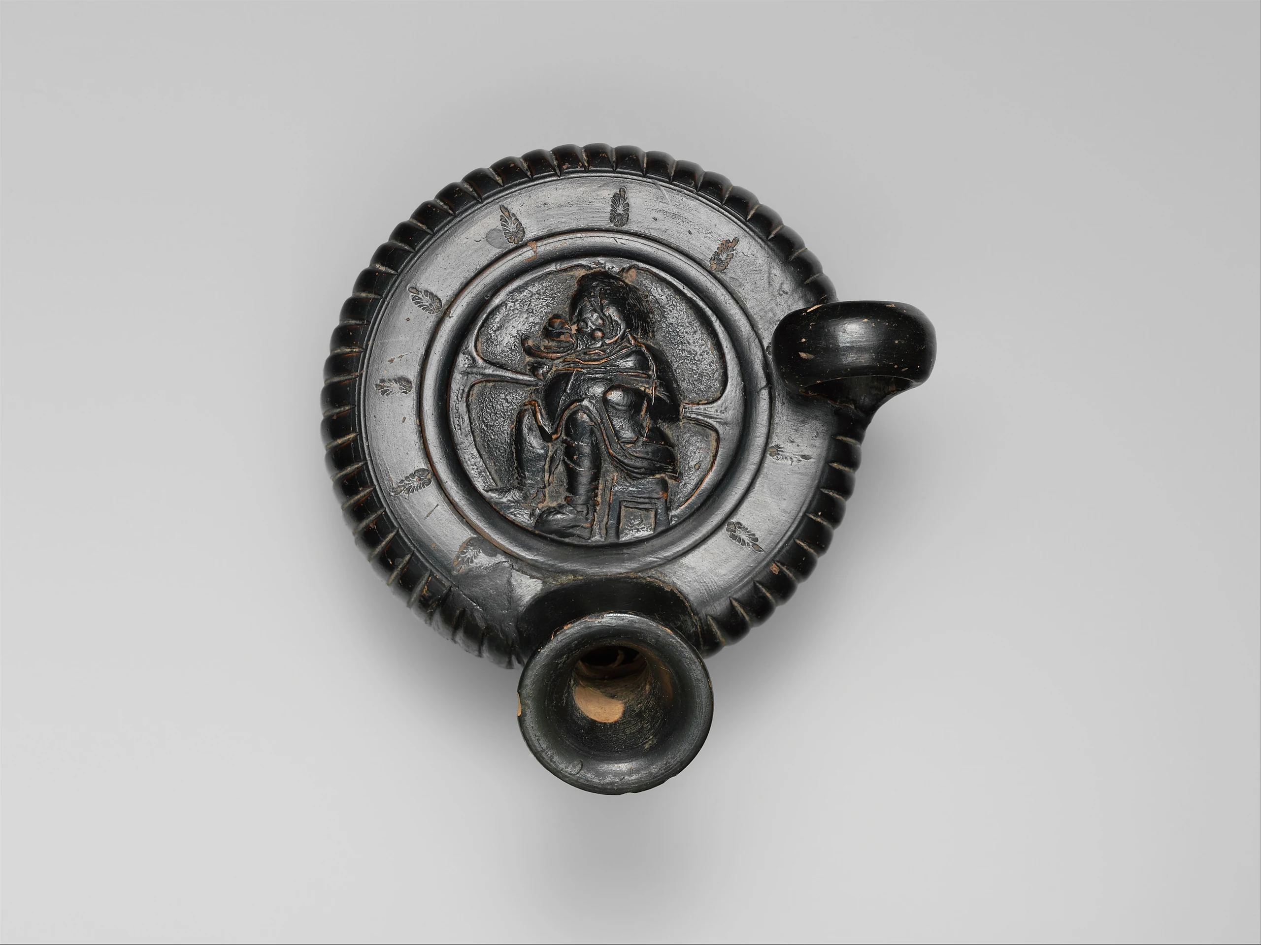 Terracotta guttus (flask with handle and vertical spout)