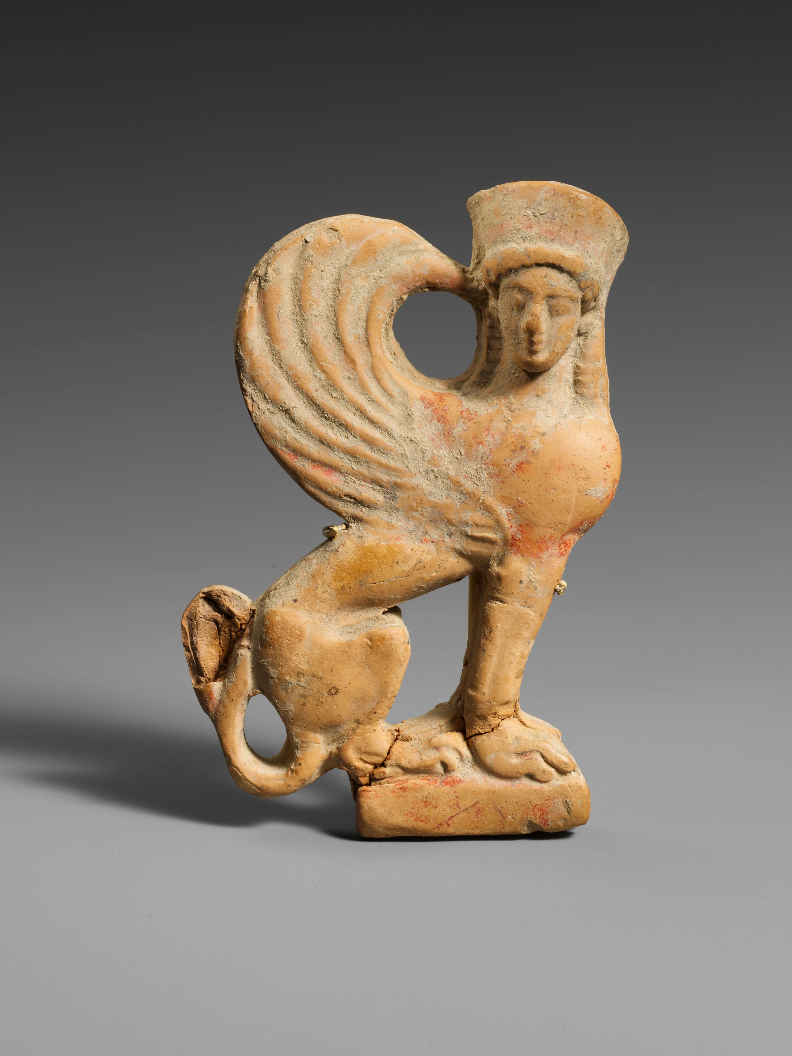 Terracotta relief of a sphinx