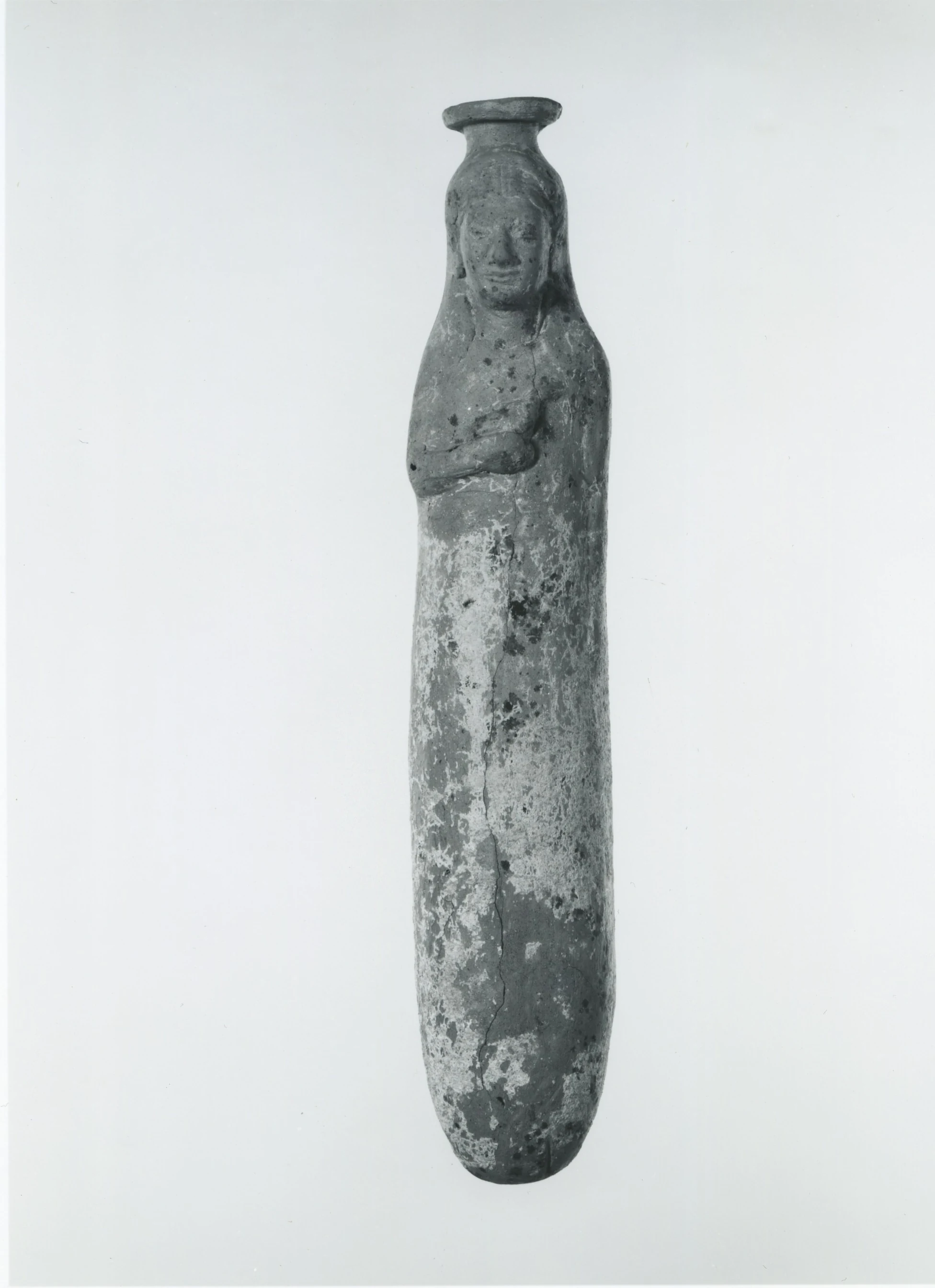 Terracotta alabastron in the form of a woman