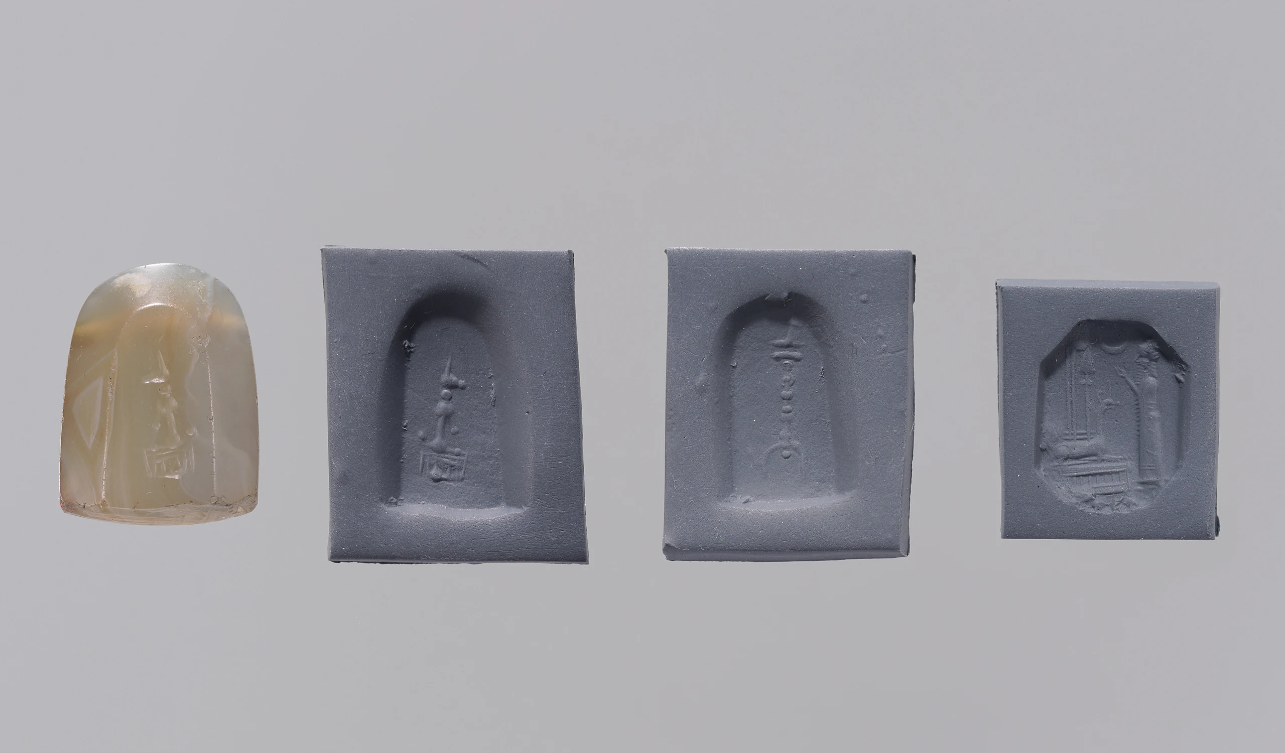 Stamp seal (octagonal pyramid) with cultic scene and divine symbols