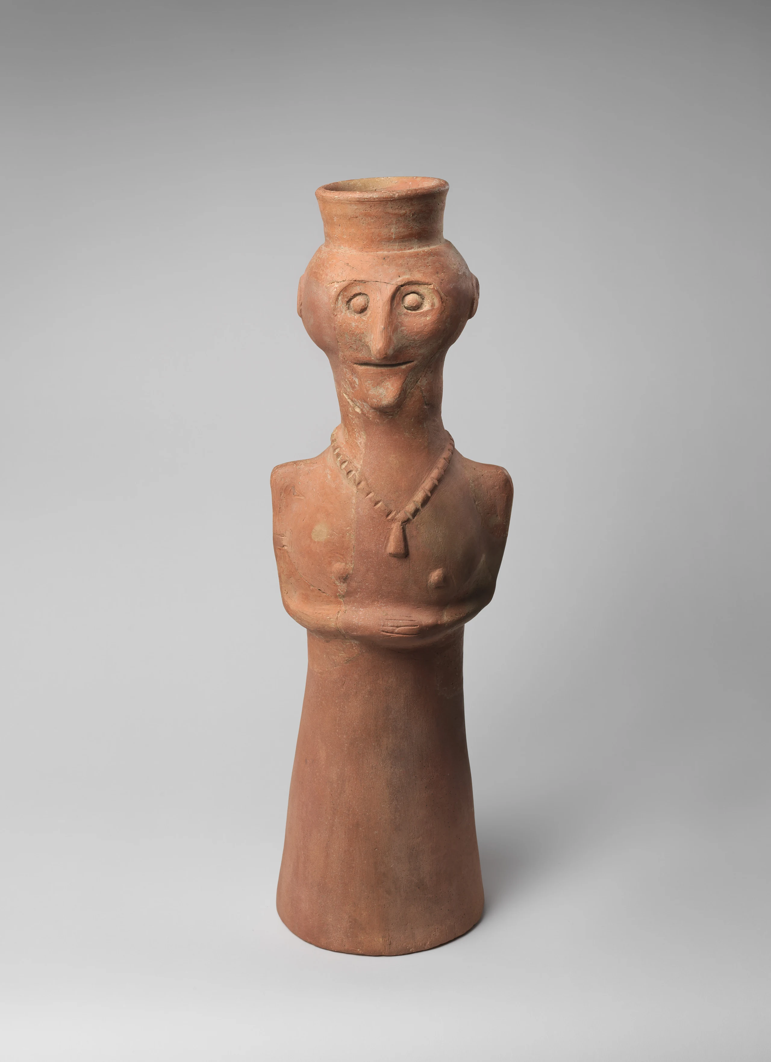 Vessel in form of female (?) figure