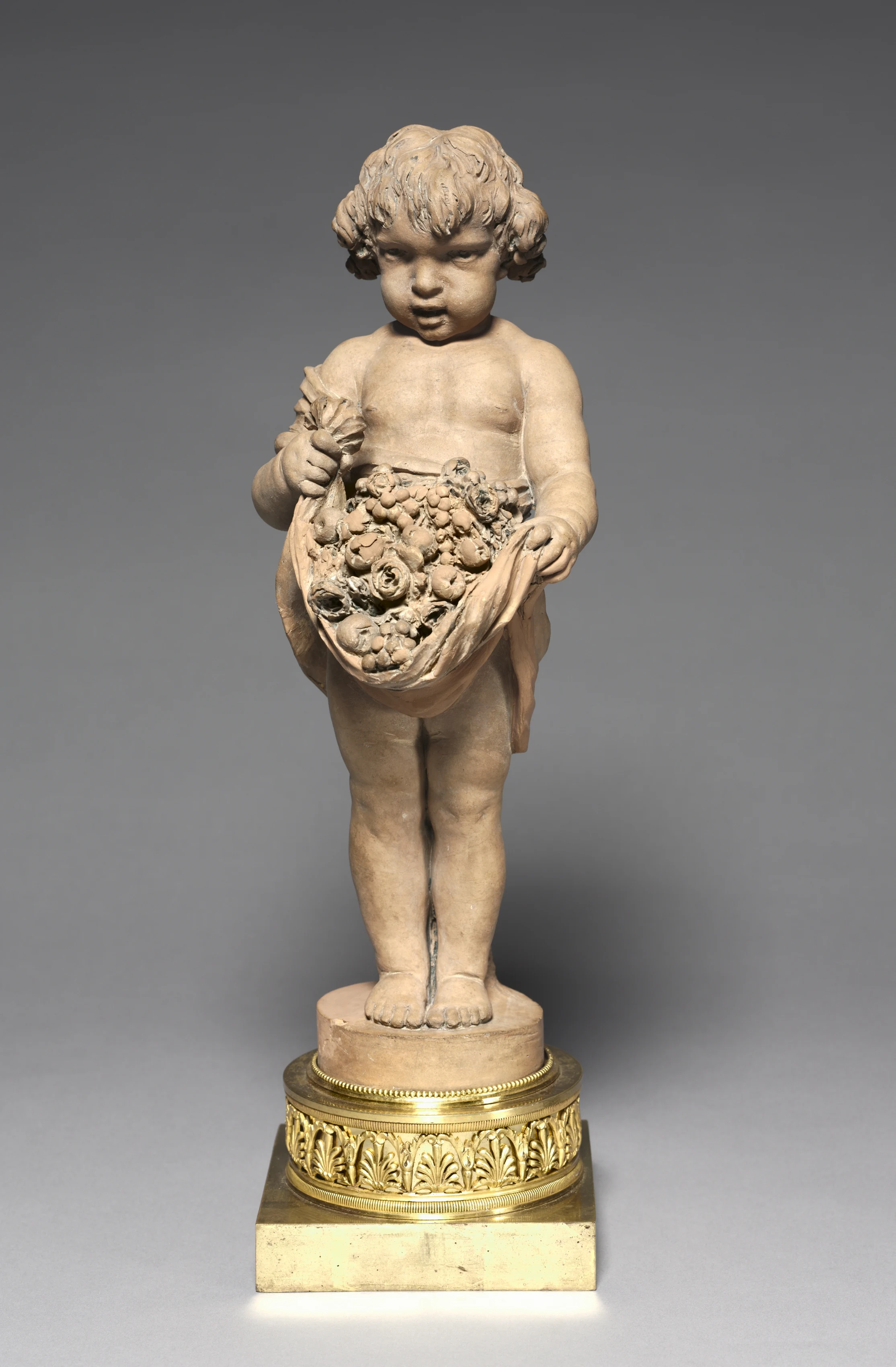 Child Carrying Fruit and Flowers