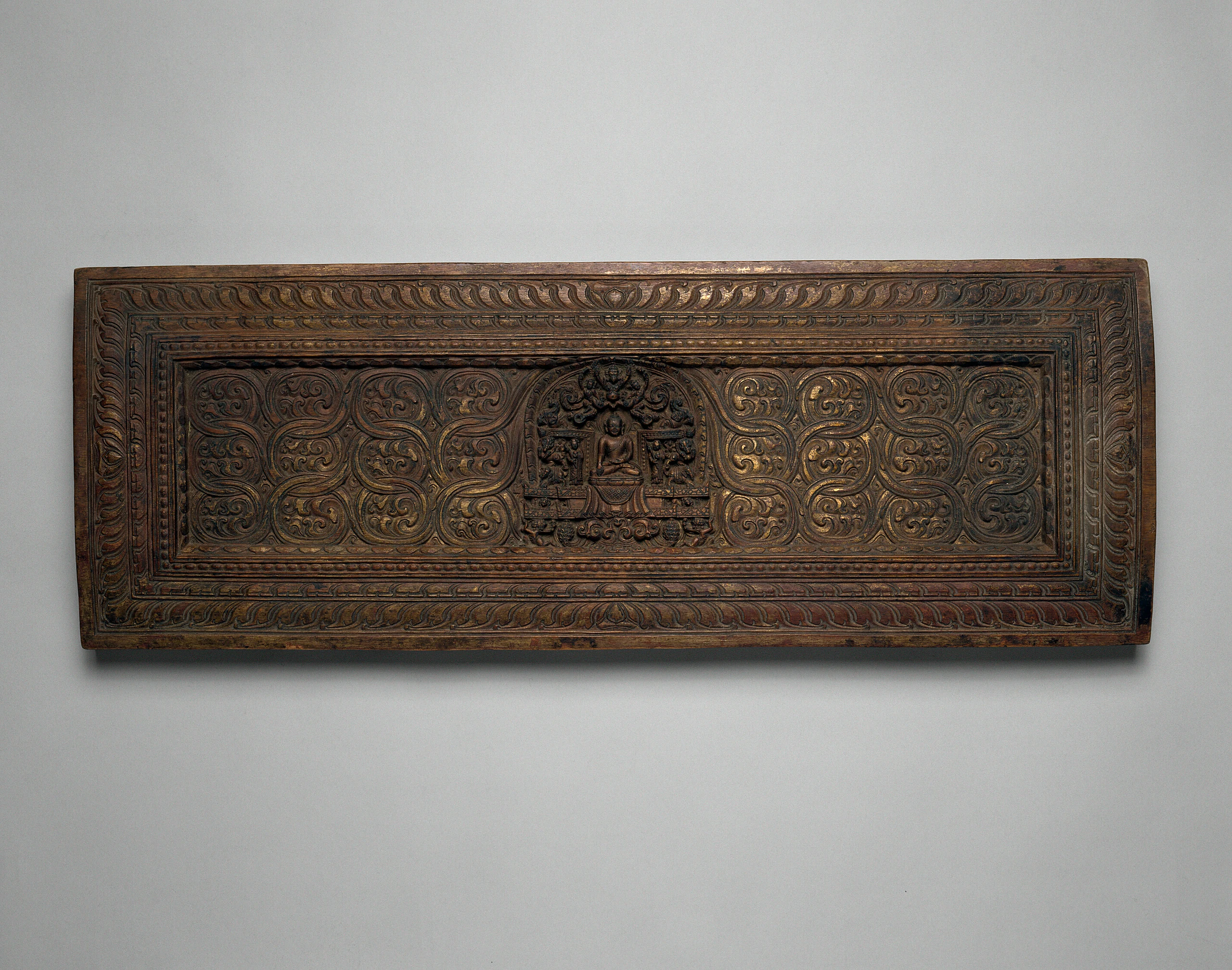 Manuscript Cover with Enshrined Sakyamuni Buddha with Hand in Earth Touching (Bhumisparsha) Mudra