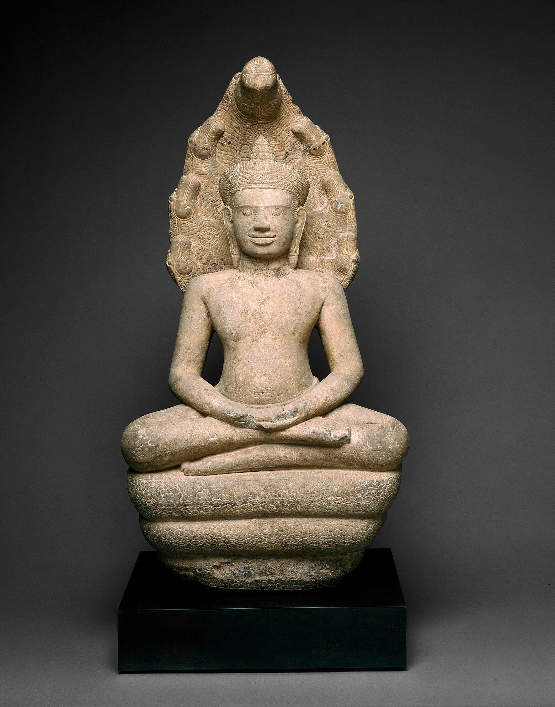 Crowned Buddha on a Multi-Headed Serpent (Naga)