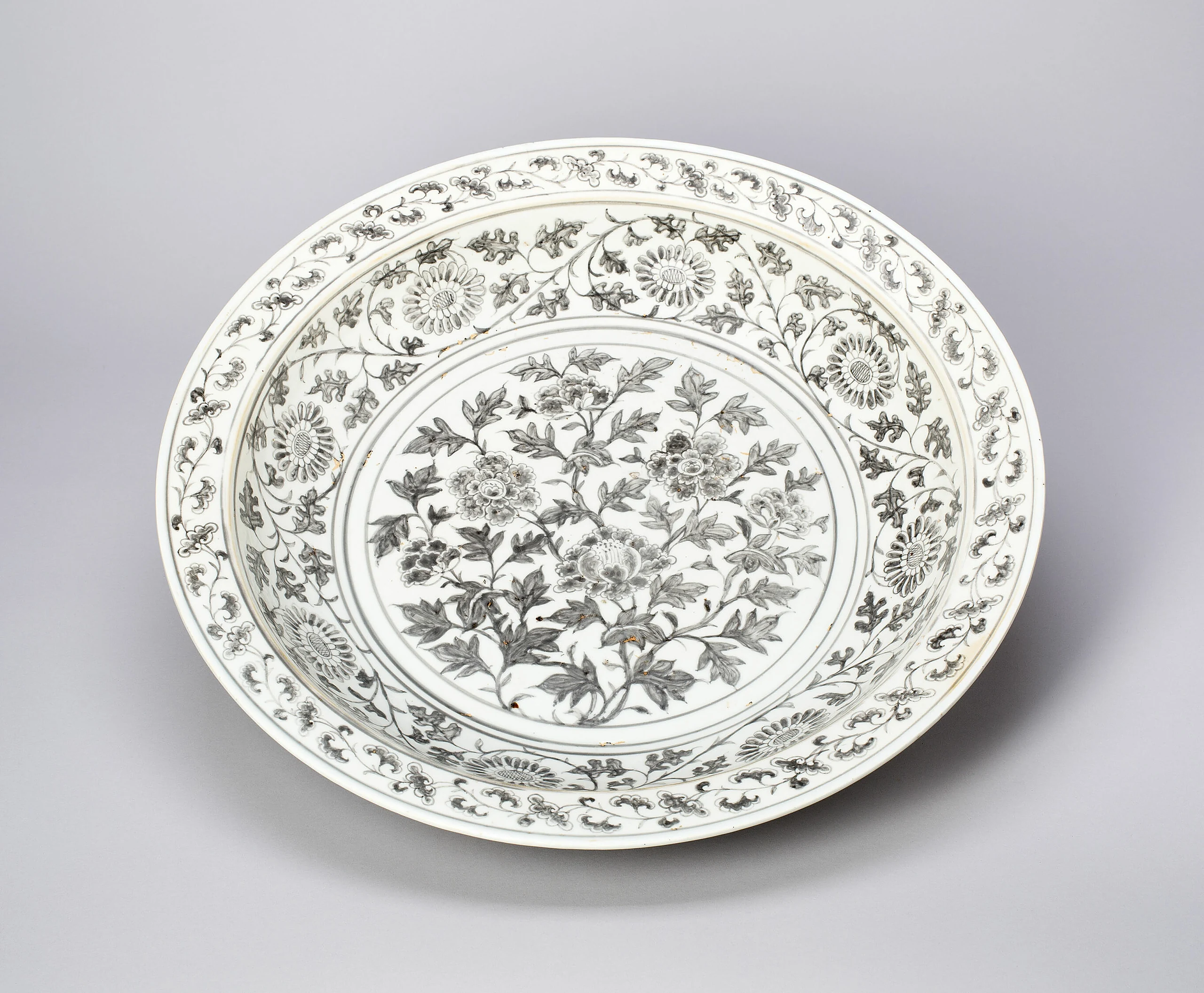 Shallow Dish with Peony Scrolls, Chrysanthemum Spray, and Key-Fret Border; Lotus Petal under RimShallow Dish with Peony Scrolls, Chrysanthemum Spray, and Key-Fret Border; Lotus Petal under RimShallow Dish with Peony Scrolls, Chrysanthemum Spray, and Key-Fret Border; Lotus Petal under Rim