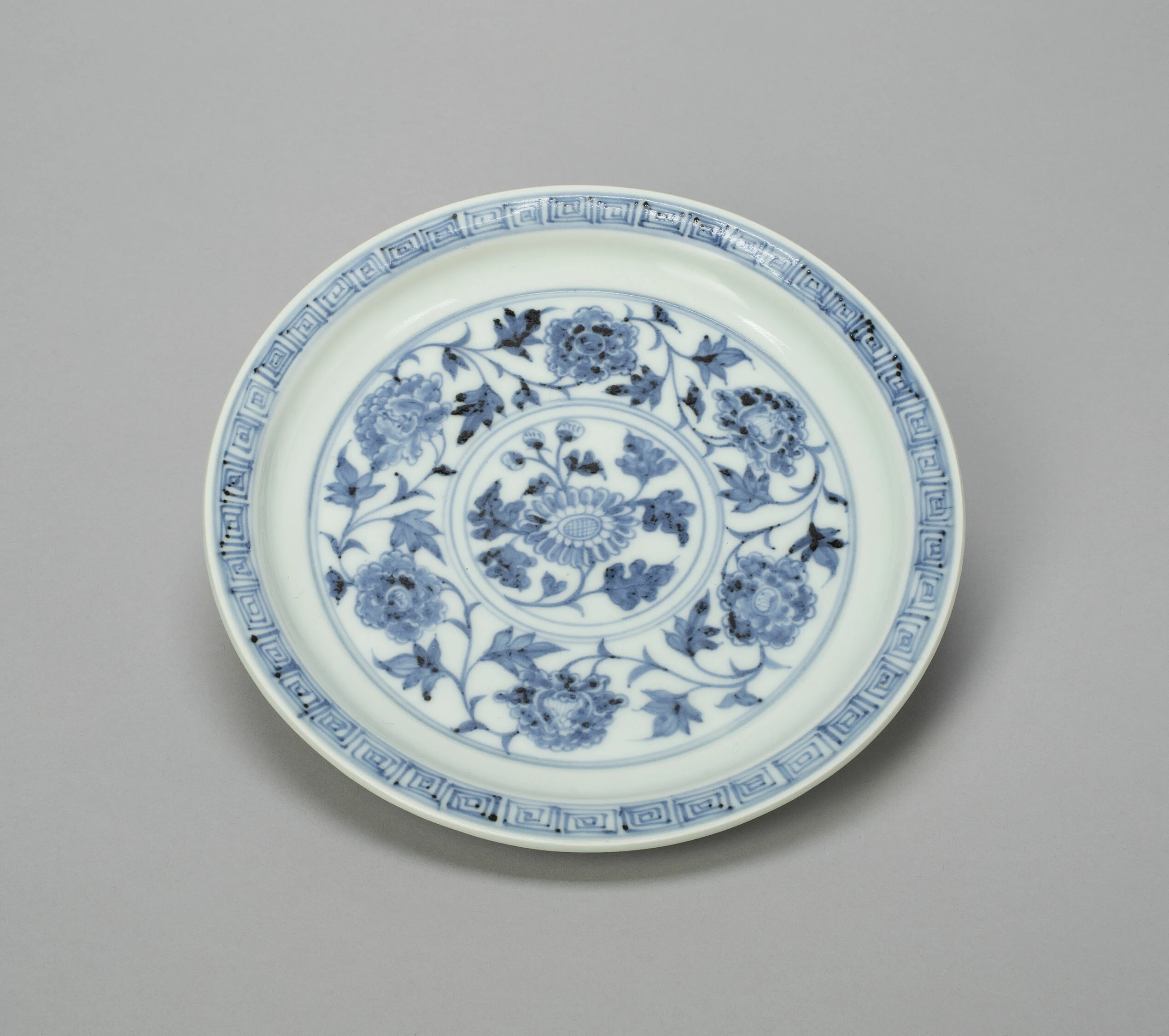 Dish with Peony Scrolls and Chrysanthemum Spray, and Lotus Panels on Reverse