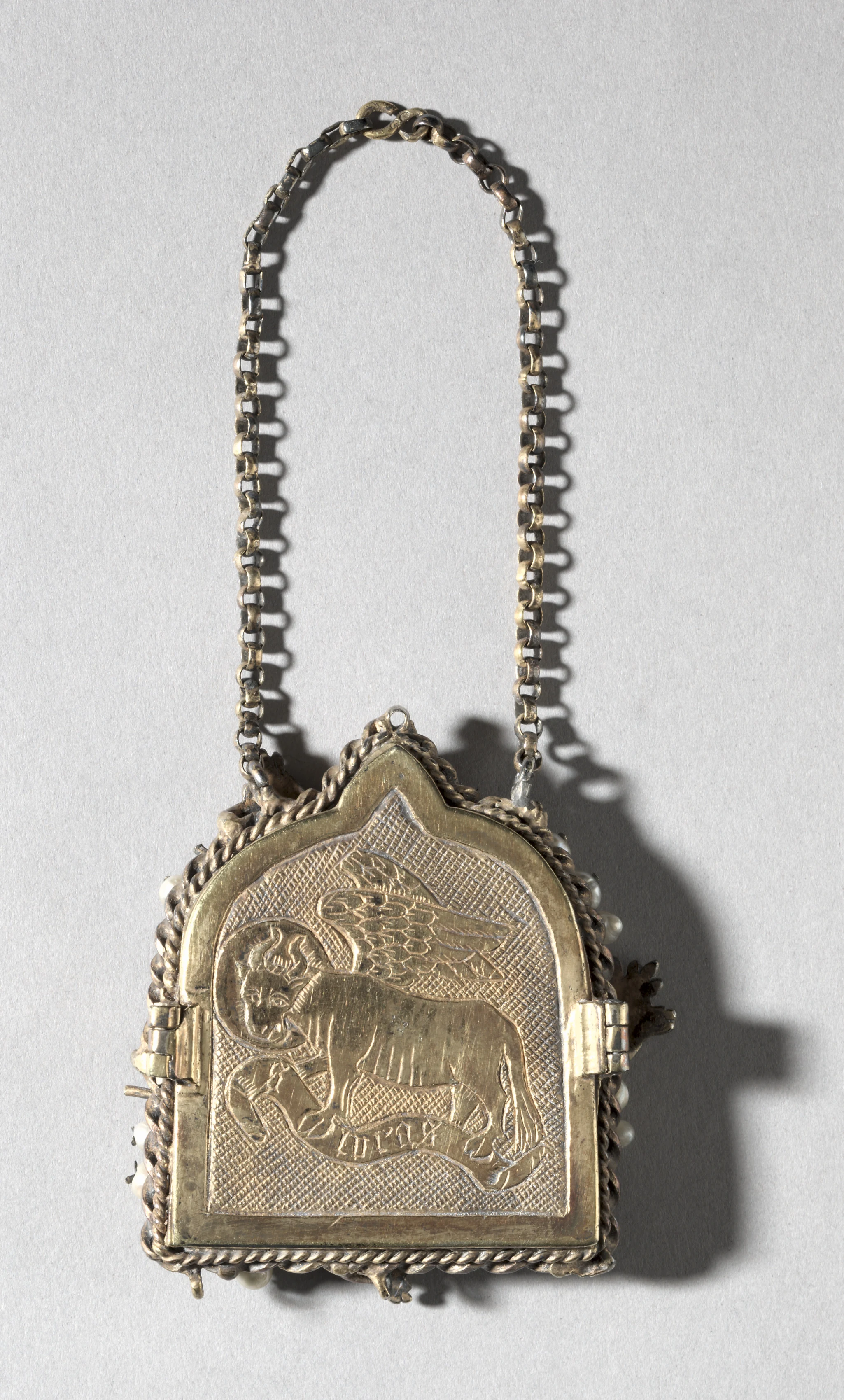 Frame with Winged Bull of Saint Luke on the back