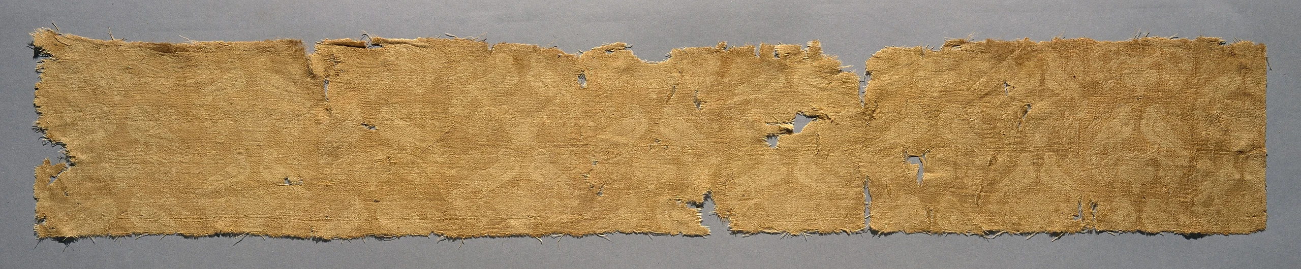 Figured woven silk textile fragment with birds