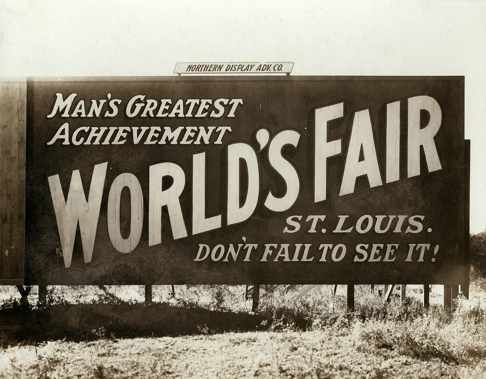 "Man's Greatest Achievement--Worlds Fair--St. Louis--Don't Fail to See It." Billboard at State and Washington Streets in Minneapolis
