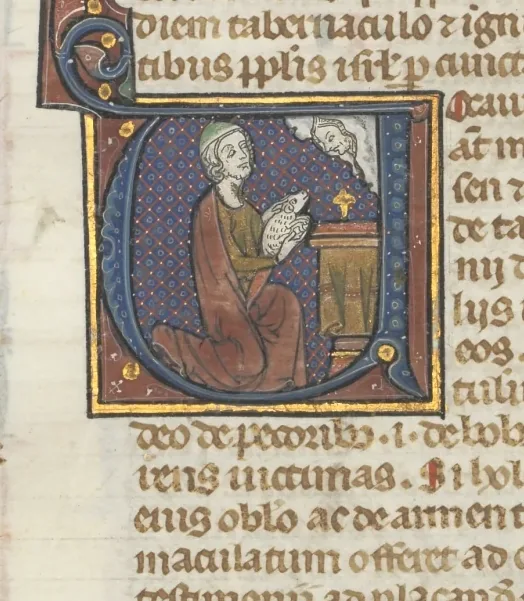Fol. 36r, Leviticus, historiated initial V, Moses offering a sacrificial lamb on an altar