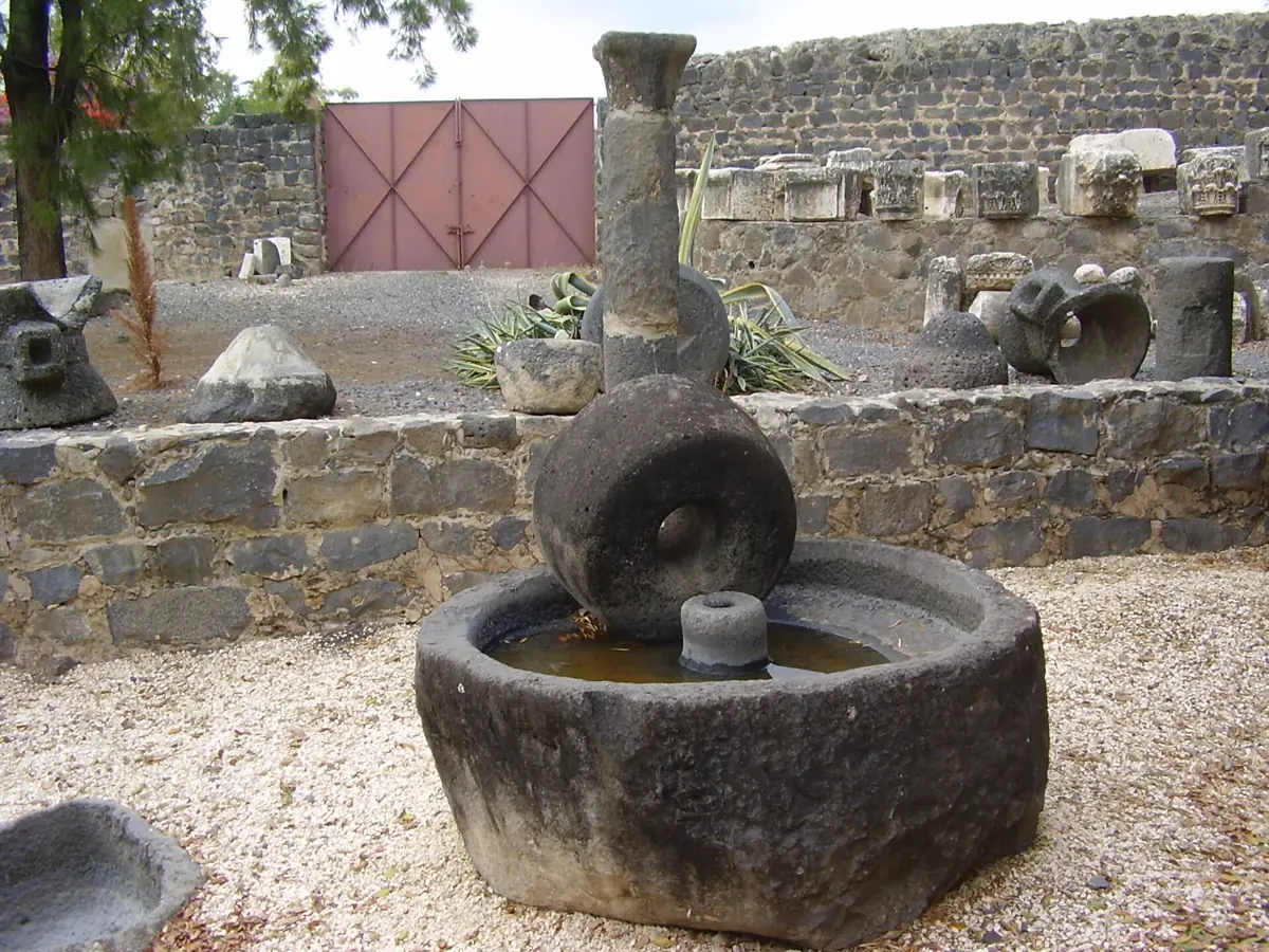 An ancient stone olive press at Capernaum