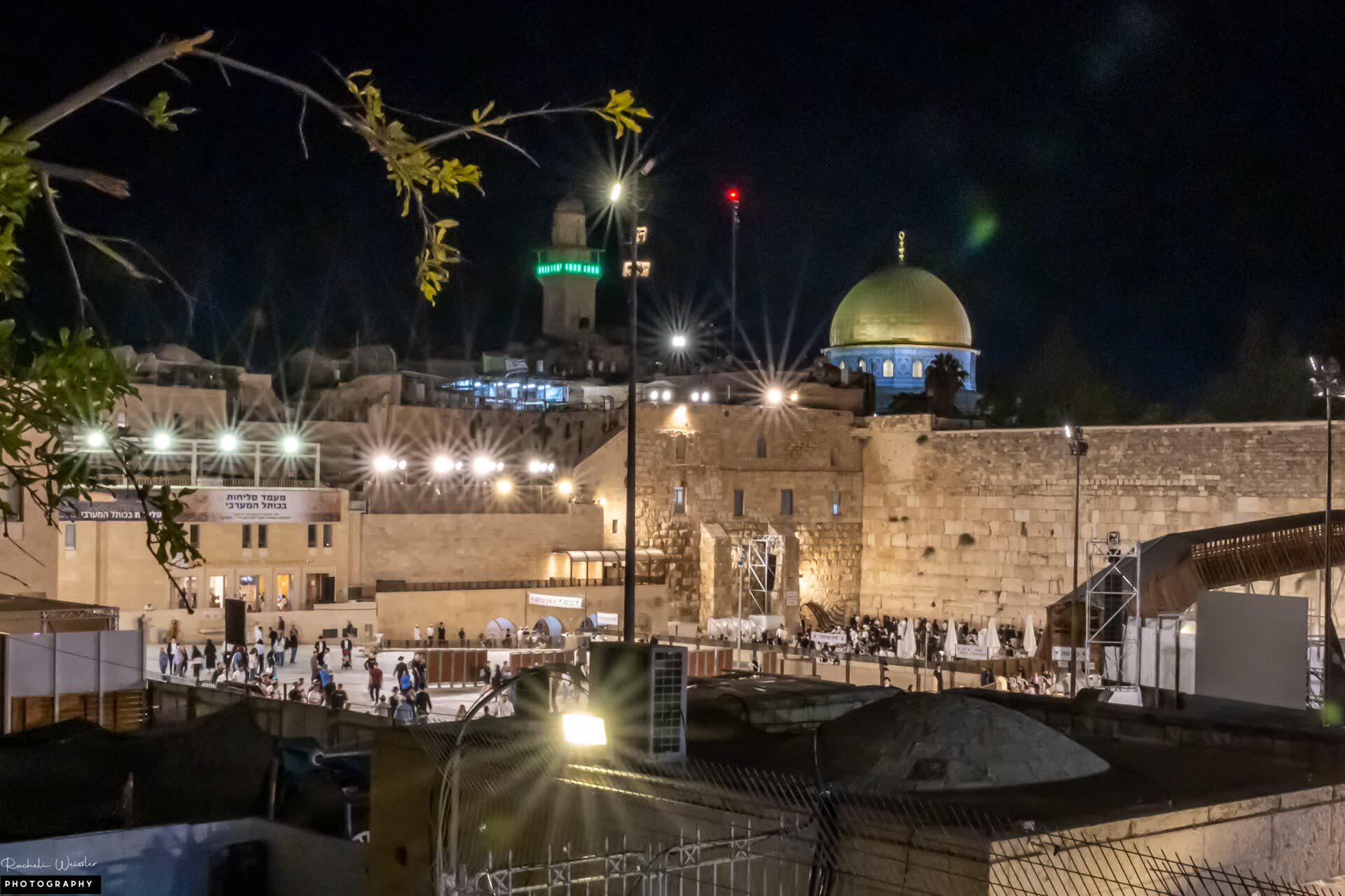 The Western Wall in Jerusalem with worshippers in prayer